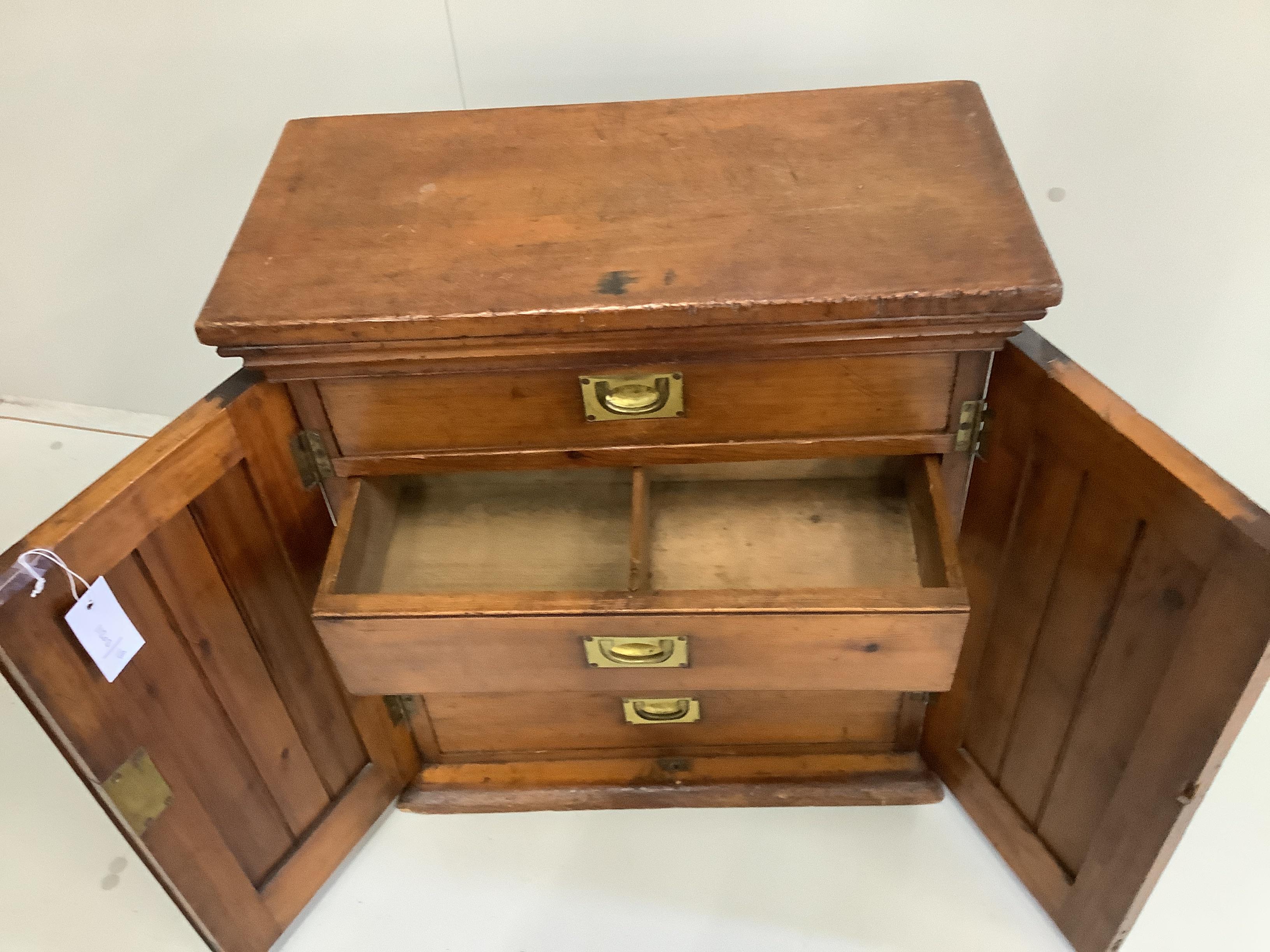 A Victorian pitch pine four drawer collectors' cabinet, width 55cm, depth 27cm, height 63cm